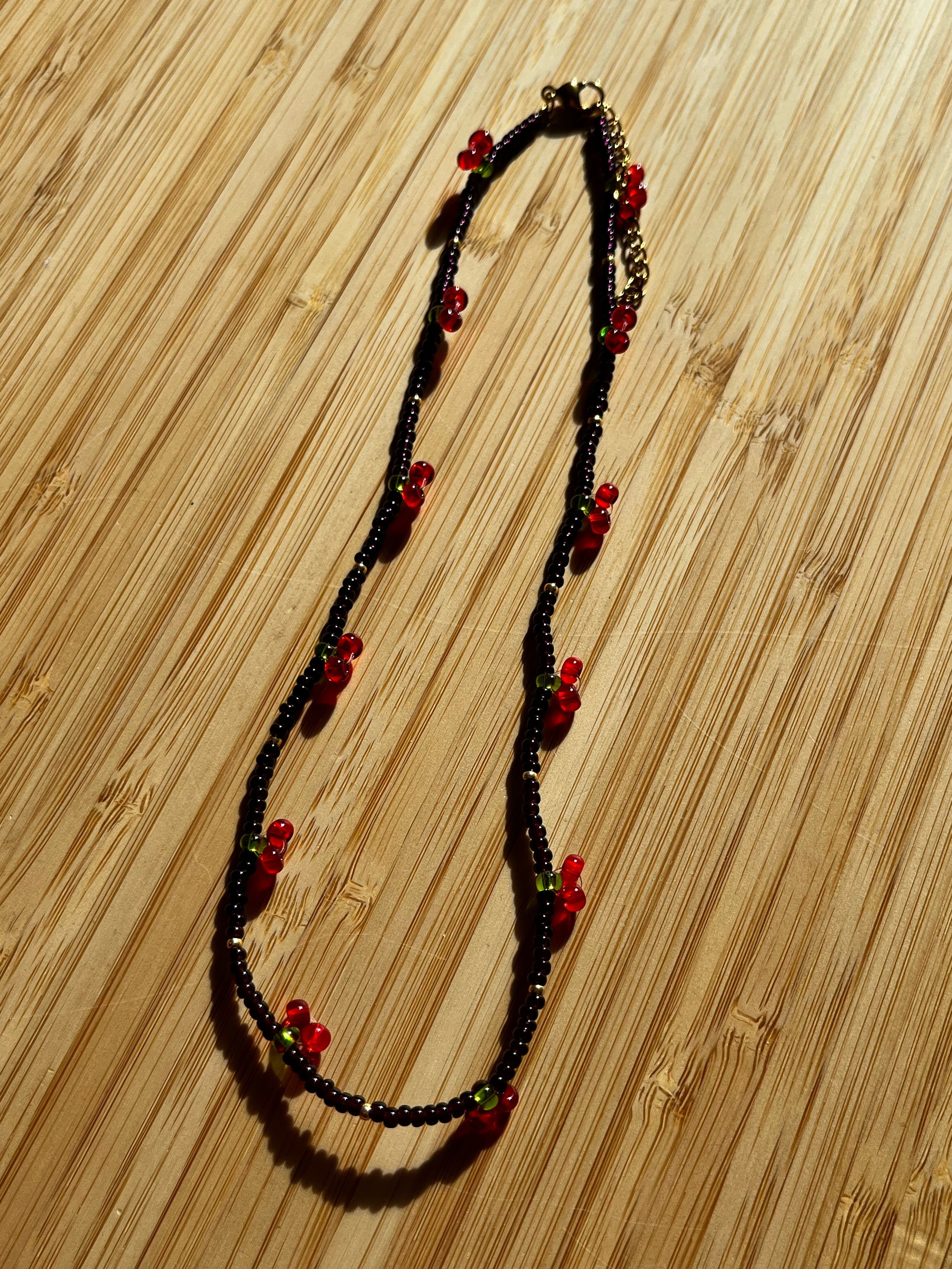 Kralenketting Donkerpaars met Kersen