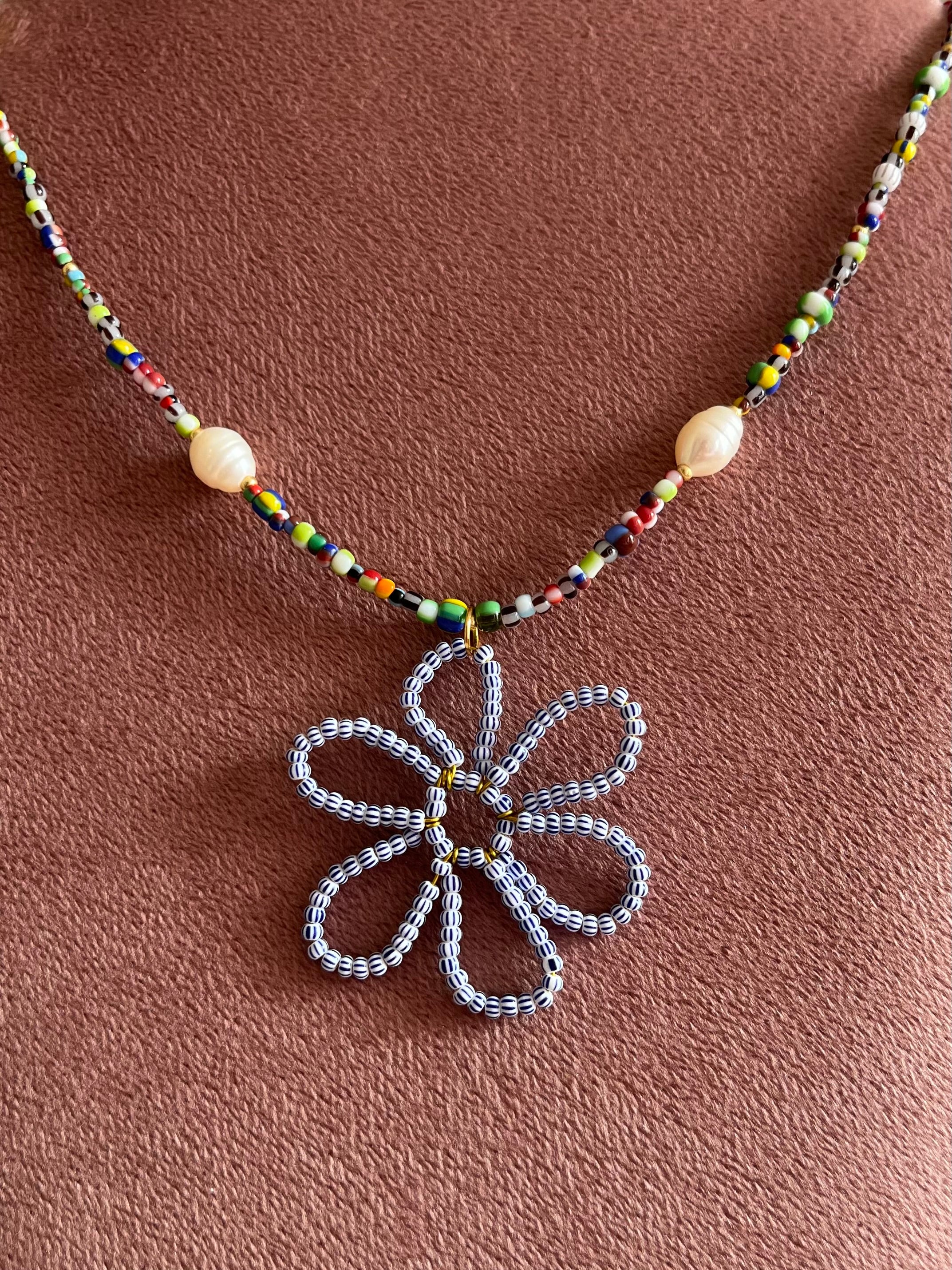 Kralenketting Strepen & Parel Kralen met Bloem Bedel