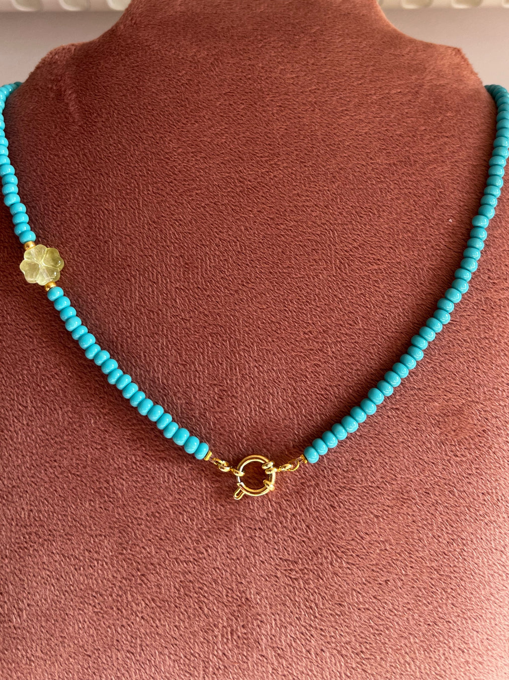 Kralenketting Blauw of Turquoise met Klavertje Vier