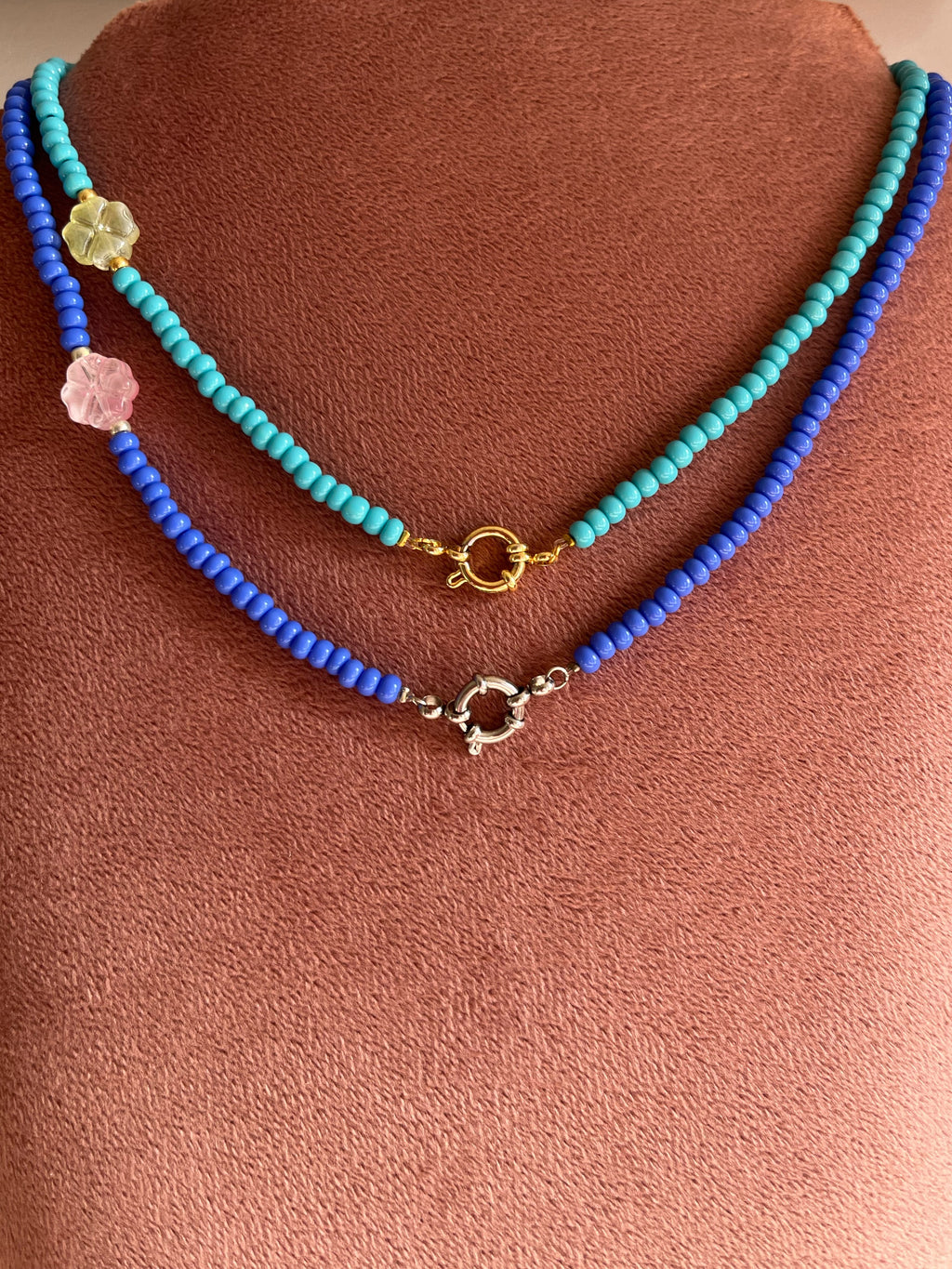 Kralenketting Blauw of Turquoise met Klavertje Vier