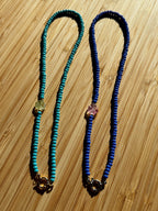 Kralenketting Blauw of Turquoise met Klavertje Vier