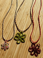 Long Beaded Necklace with Flower Charm