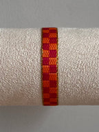 Zomerse lintarmbandjes met tekst in paars/oranje kleuren