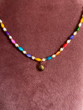 Kralenketting Lichtblauw & Meerkleurig met Zon Bedel